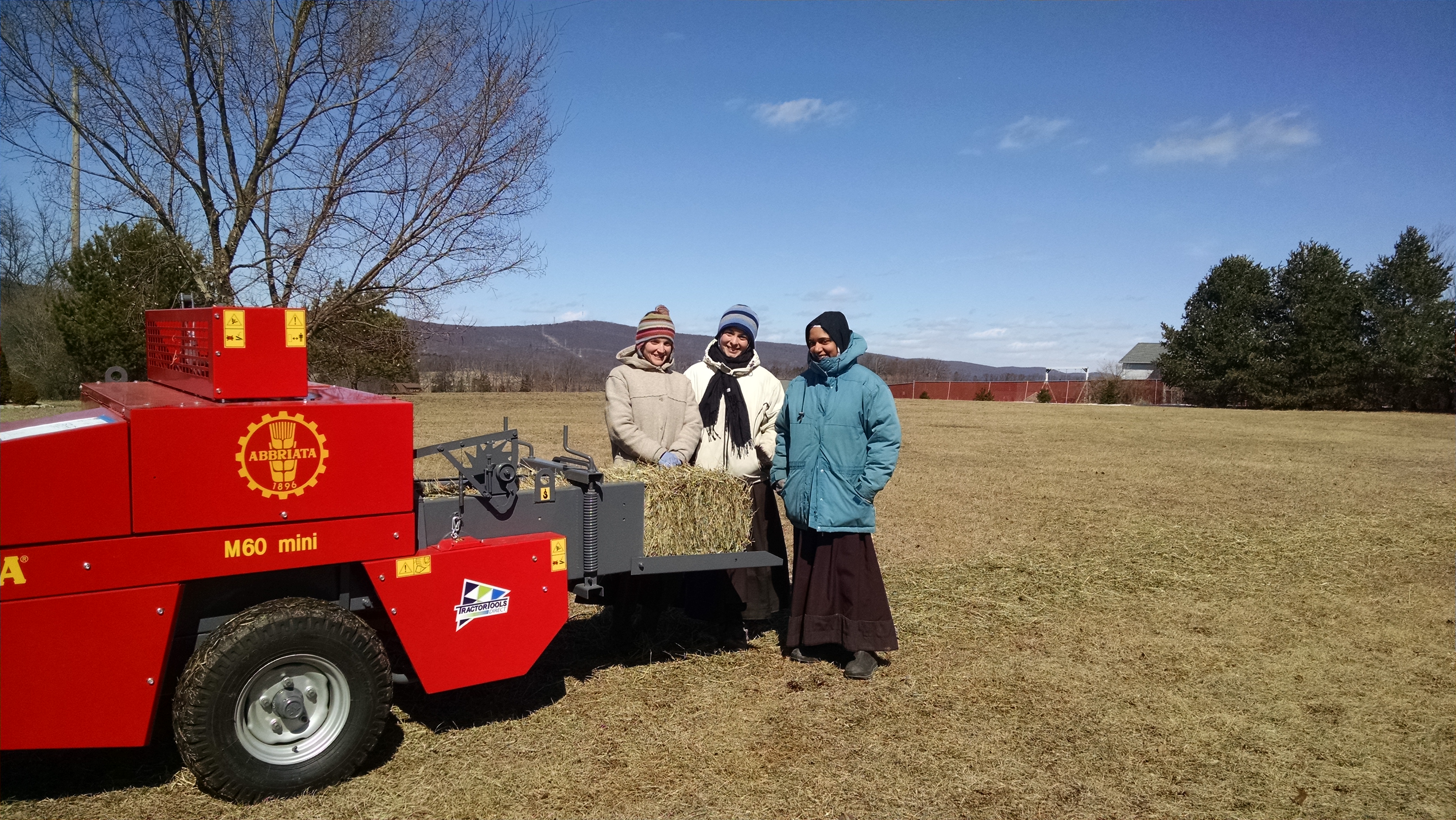 The nuns of Holy Annunciation Monastery with their new Abbriata square baler from Tractor Tools Direct. 