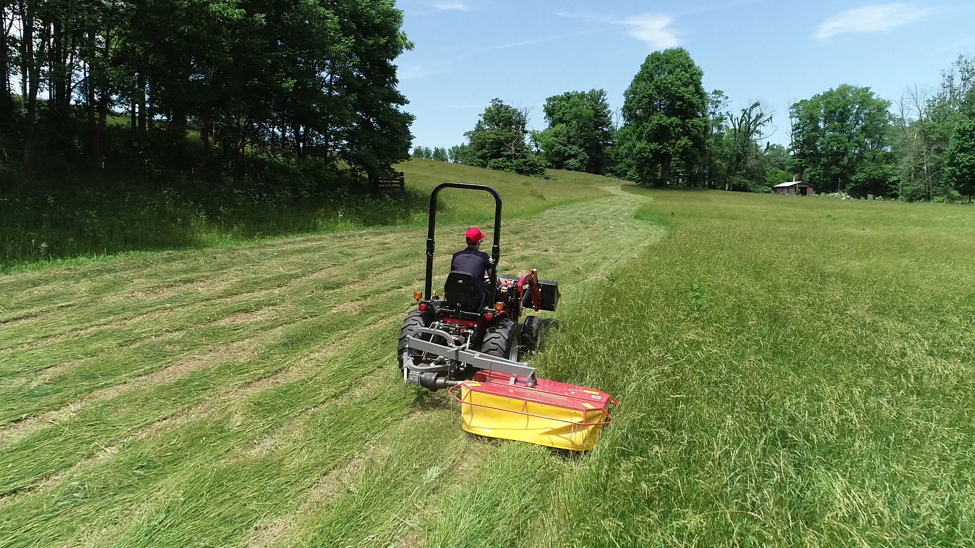 Mowing hay with an Ibex TX45 Drum Mower. 
