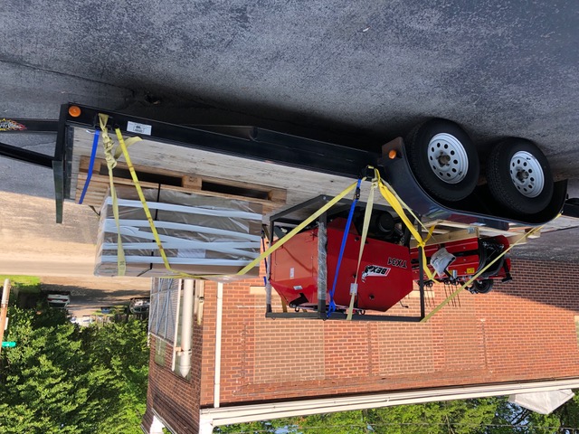 Ibex hay package including an Ibex TX31 Mini Round Baler with Twine Wrap, and Ibex Drum Mower , and an Ibex Belt Rake loaded and ready for shipment. 