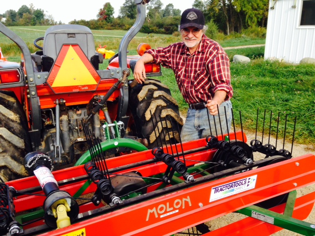 Happy Tractor Tools Direct customer with his new hay equipment. 