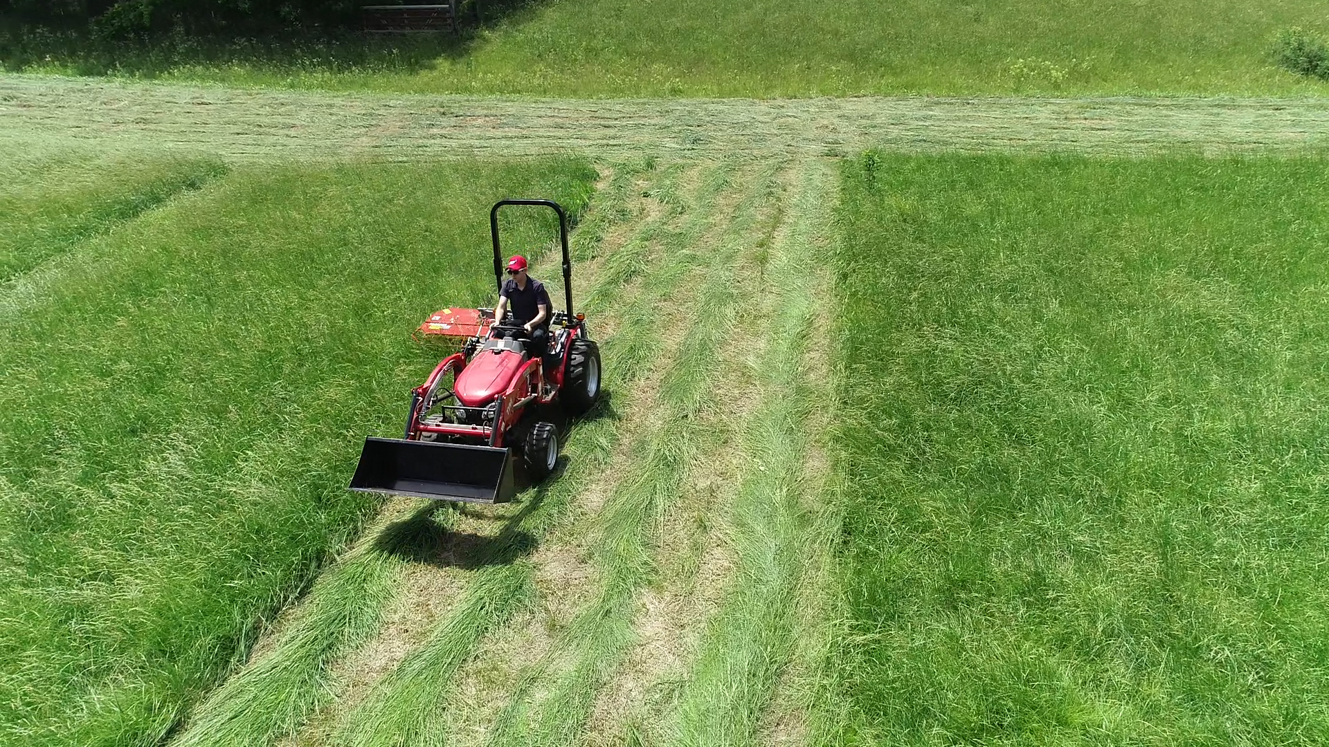 Mowing pattern in a hay field using an Ibex TX45 Drum Mower.